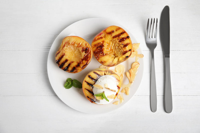 Grilled Peaches with Coconut Butter and Almonds