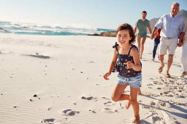 family on beach, grandchildren