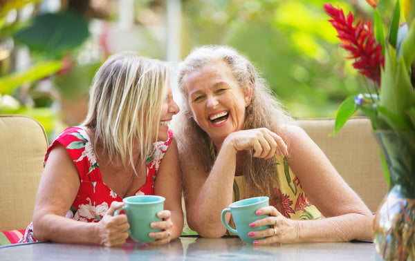 Pair,Of,Cute,Middle,Aged,Female,Friends,Laughing