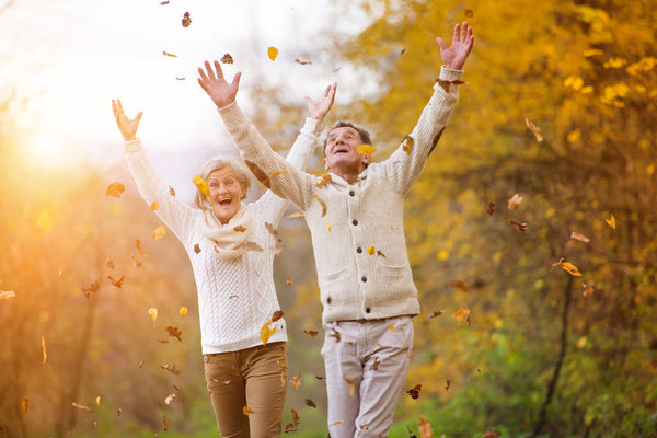 Active,Seniors,Having,Fun,And,Playing,With,The,Leaves,In
